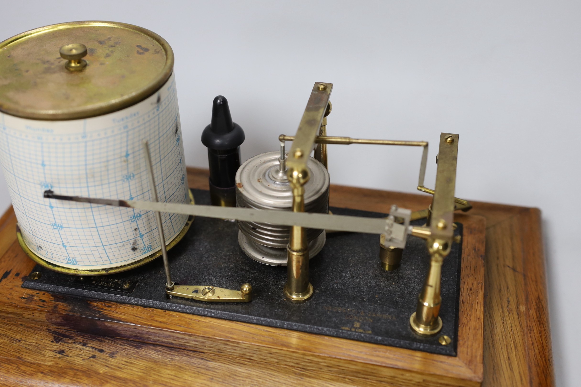 A Negretti & Zambra oak cased barograph, 34cm wide